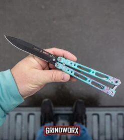 Bear Ops Bear Song IV Cyan Speckle Blue Butterfly Knife - Black -Kershaw Store Bear Ops Bear Song IV Butterfly Knife Cyan Speckle Blue Black BHQ 83465 kp in hand web large